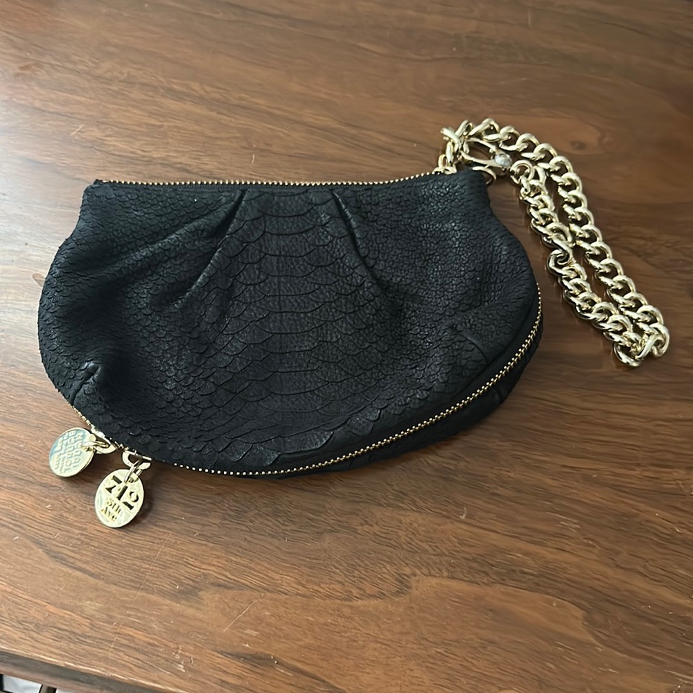 Henri Bendel Black expandable wristlet